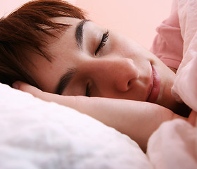 Image showing Beautiful young woman sleeping.