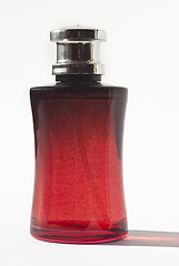 Image showing perfume in red bottle