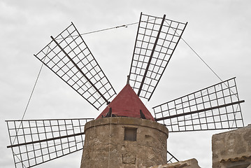 Image showing Old windmill on the salines of Trapani