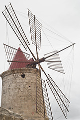 Image showing Old windmill on the salines of Trapani