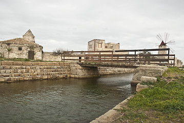 Image showing Old windmill  with lake and bridge