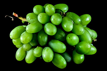 Image showing bunch of green grapes on a black background