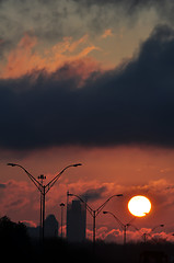 Image showing dramatic sunrise over city