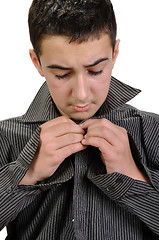 Image showing teenager boy dressing up