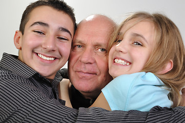 Image showing family portrait of elderly father with children