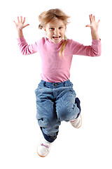 Image showing happy jumping girl isolated over white