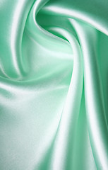 Image showing Smooth elegant azure silk as background