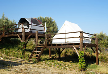 Image showing tents on stilts