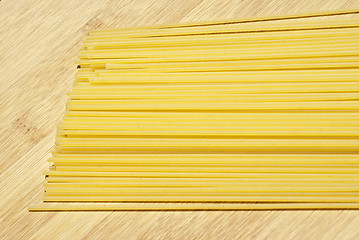 Image showing spaghetti on wooden board