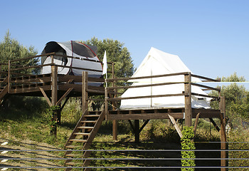 Image showing tents on stilts