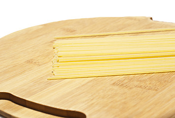 Image showing spaghetti on wooden board