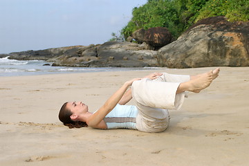 Image showing Young woman exercising