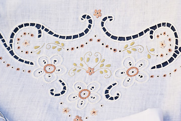 Image showing carved and embroidered cloth. handmade