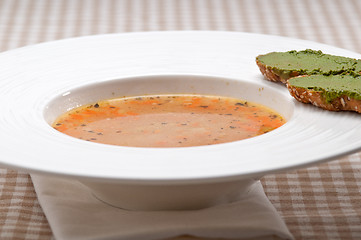Image showing Italian minestrone soup with pesto crostini on side