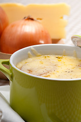 Image showing onion soup with melted cheese and bread on top