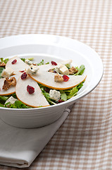 Image showing Fresh pears arugula gorgonzola cheese salad