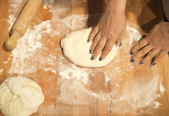 Image showing Making pizza