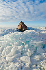 Image showing Big stone in the ice on the Baltic Sea coas