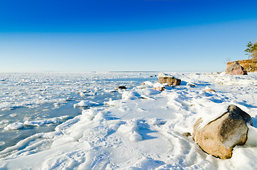 Image showing  Stones in the ice on the Baltic Sea coast 