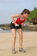 Image showing Young woman exercising