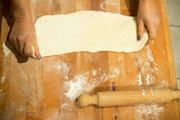 Image showing Making pizza