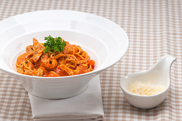 Image showing Italian spaghetti pasta with tomato and chicken