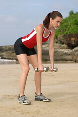 Image showing Young woman exercising