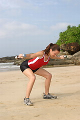 Image showing Young woman exercising