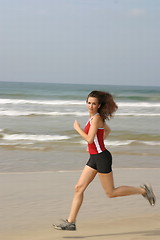 Image showing Young woman exercising