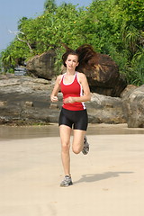 Image showing Young woman exercising