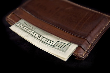 Image showing wallet with hundred dollars