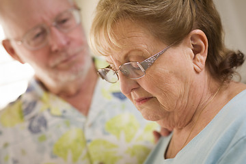 Image showing Senior Adult Male Consoles Sad Senior Adult Female