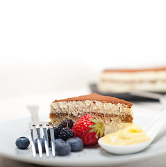 Image showing tiramisu dessert with berries and cream