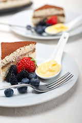 Image showing tiramisu dessert with berries and cream