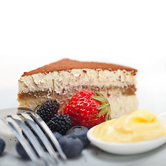 Image showing tiramisu dessert with berries and cream