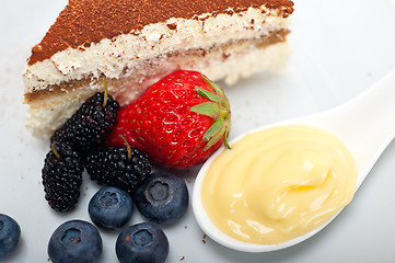 Image showing tiramisu dessert with berries and cream