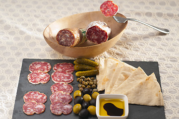 Image showing cold cut platter with pita bread and pickles