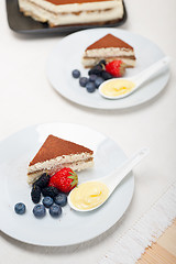 Image showing tiramisu dessert with berries and cream