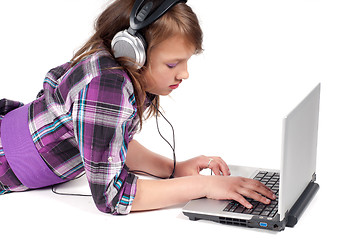 Image showing Teenager girl in headphones in studio