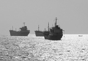 Image showing Three small oil tanker at anchor