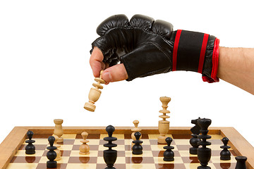 Image showing Playing chess in freefight gloves, isolated