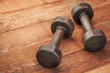 Image showing vintage iron dumbbells