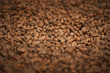 Image showing Fresh fried coffee beans close-up