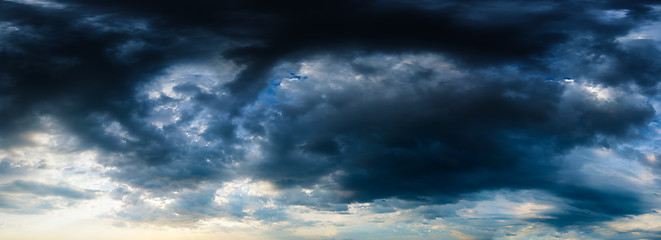 Image showing Stormy dark blue cloudy sky. High resolution panorama.