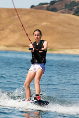 Image showing Girl wakeboarding