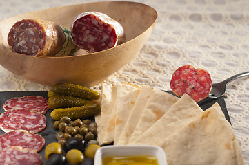 Image showing cold cut platter with pita bread and pickles