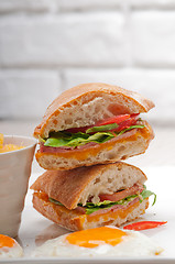 Image showing ciabatta panini sandwich eggs tomato lettuce