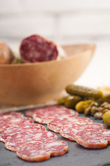 Image showing cold cut platter with pita bread and pickles