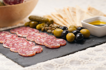 Image showing cold cut platter with pita bread and pickles