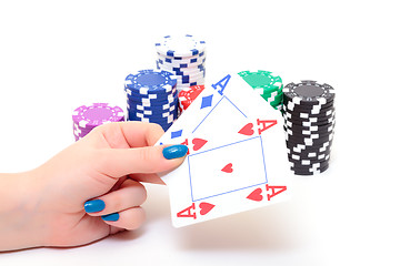 Image showing Hand with two Aces and Stacks Poker Chips